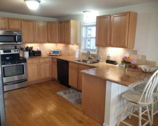Kitchen is perfect for a condo or apartment