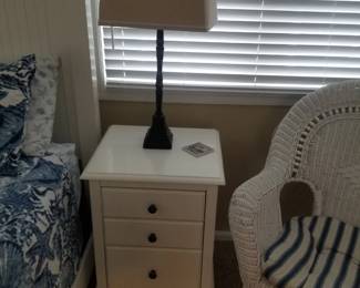 3-drawer nightstand; table lamp