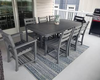 Polyresin dining set seats 8; rug