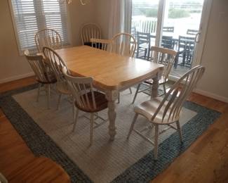 Dining table seats up to 10. Shown with leaves. Original set includes table; leaves & 6 matching chairs