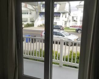 Sliding glass doors; curtain rods & panels