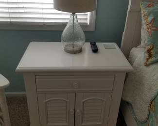 Coastal chic queen bedroom suite: nightstand; table lamp