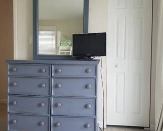 Blue 8-drawer dresser with mirror; TV