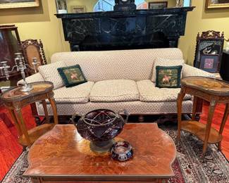 Turn of century carved base down sofa