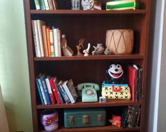 Books, phone, drum, kaleidoscope, music boxes