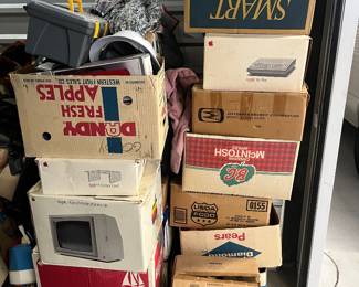 Look at all these cool old boxes! Sorry, the Apple computers are not actually in the boxes.