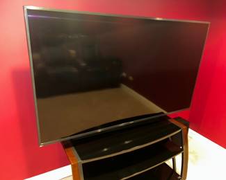 70" Smart TV w/ stand and speakers