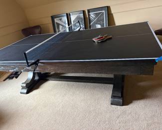 pool table shown with ping pong top