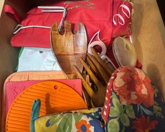 Pot holders, dish towels, wooden salad tongs
