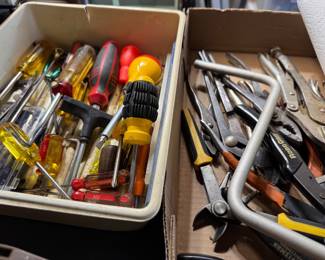 Boxes and boxes of tools, screwdrivers, hammers