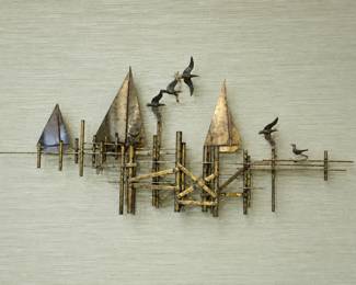 Mid-Century Modern Brutalist wall sculpture by Curtis Jeré depicts a harbor scene with gilded brass sailboats, a dimensional pier structure, and soaring seagulls