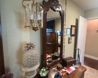 Hanging chandelier and a dresser full