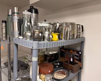 more kitchen ware and metal shelving