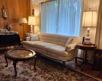 Sofa $100, cocktail table $40, end tables $40 each.