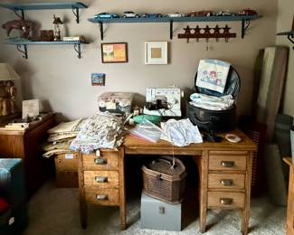 Vintage desk, sewing machine and notions