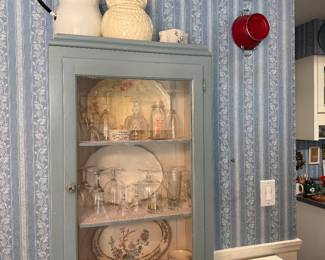 Cupboard, dishes, collanders