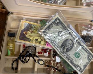 Coins, paper money, religious items