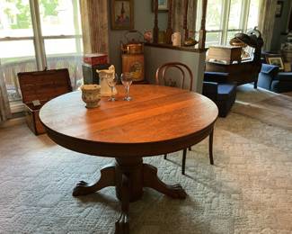 Oak pedestal base dining table with 4 chairs