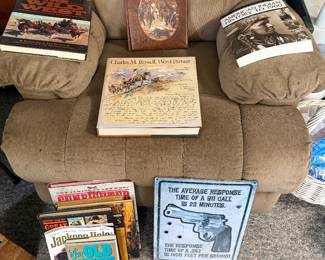 Recliner, western books, signs