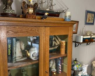 Oak antique glassed book case cabinet, books, model ships, eagles