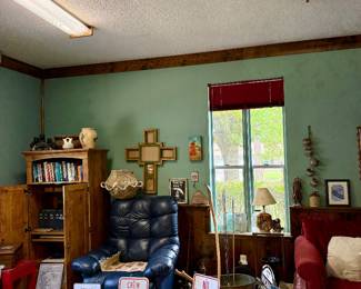 Signs, armoire, leather recliner, art, pottery