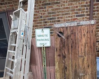 Ladders, sign, yard art 