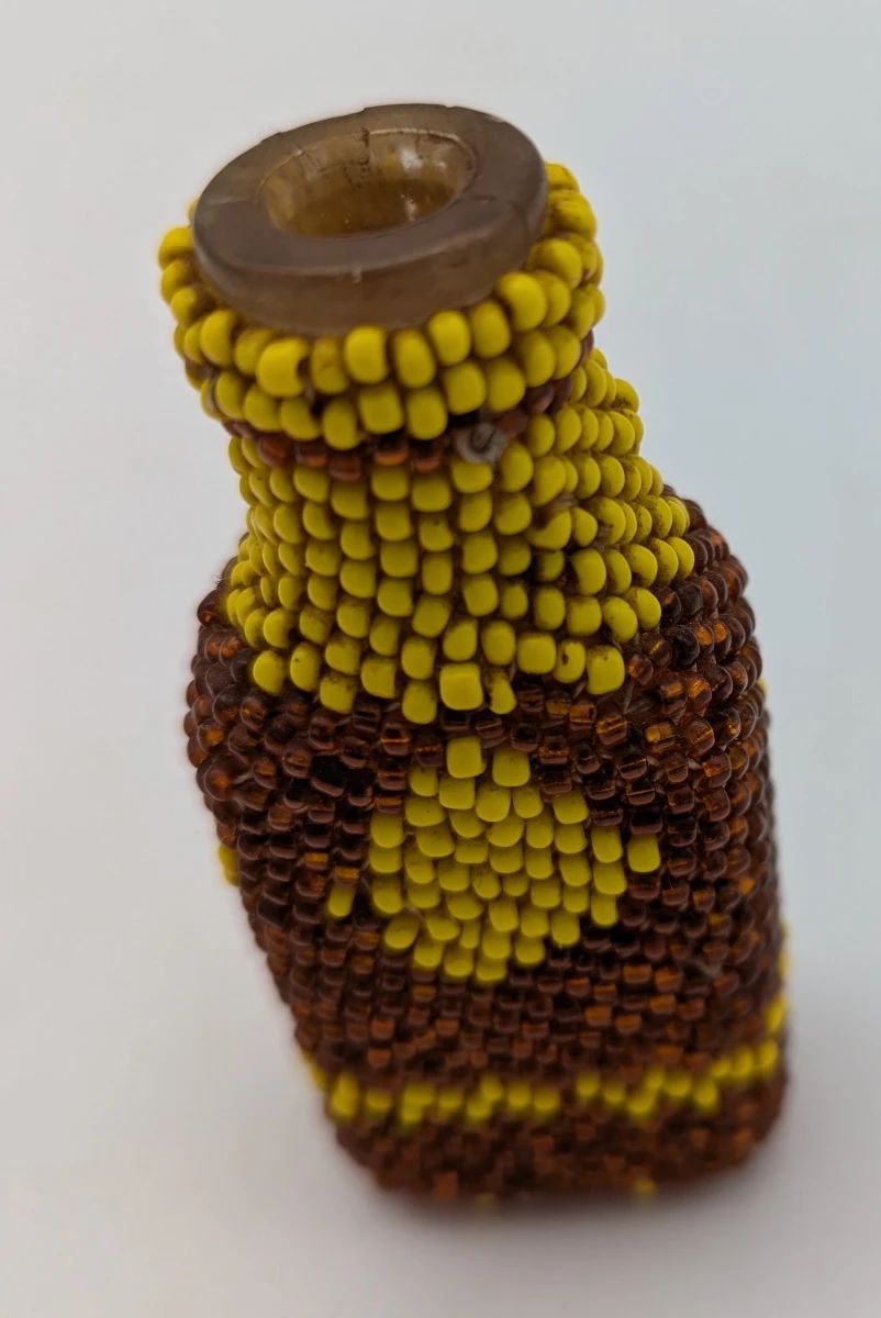 Native American beaded bottle