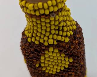Native American beaded bottle