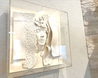 Cast paper sculpture in lucite frame