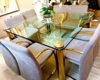 Striking MCM brass and glass dining table