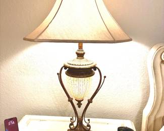 Pair of urn shape lamps that also light at base