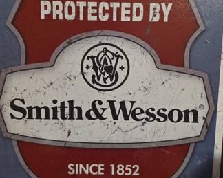 Smith & Wesson "Protected By" Tin Sign