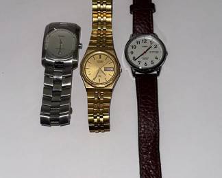 Collection of Three Gold-Tone Quartz Wristwatches: Fossil, Seiko, and Timex
