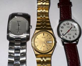 Collection of Three Gold-Tone Quartz Wristwatches: Fossil, Seiko, and Timex