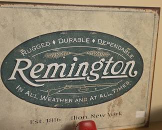 Remington "In All Weather and at All Times" Tin Sign