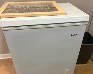 haier chest freezer with tip opening lid.
