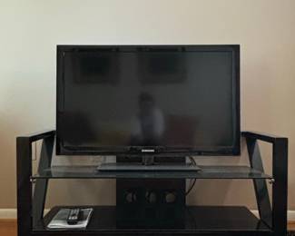 Samsung Flat-Panel Television with Black Metal and Glass TV Stand