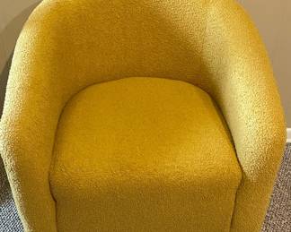 yellow boucle barrel accent chair