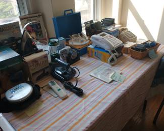 Samsung DVD Player, New Homedics Fountain, Panasonic CD player, travel irons, clocks, Home