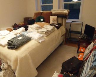 Linens, hats, floor pillows, stepstool, beach chairs and soft coolers, luggage