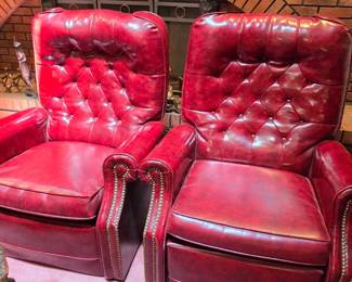 Pair of burgundy faux leather recliner chairs