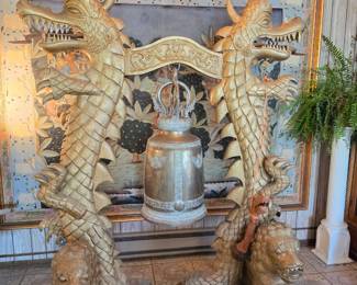 Solid brass gong and carved wood dragons from a temple in Thailand