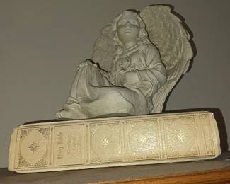 Sitting Angel on Bible