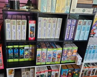 Puzzles on the top are Factory Sealed 