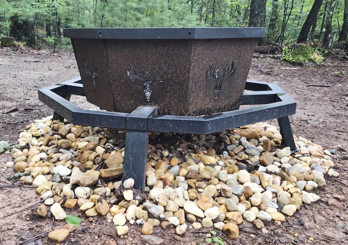 BOINN 35" Octagonal Fire Pit - features a rustic deer design on an iron base