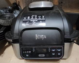 Ninja Foodi 4-in-1 Indoor Grill with all the components.