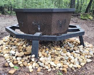 BOINN 35" Octagonal Fire Pit - features a rustic deer design on an iron base