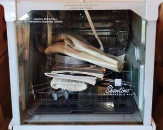 Showtime Rotisserie Oven - comes with instruction manual, recipe book and oven mits