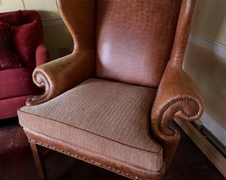 Leather wing back chair.