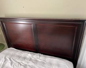 Closer look at the headboard for the queen bed with mattress and box.